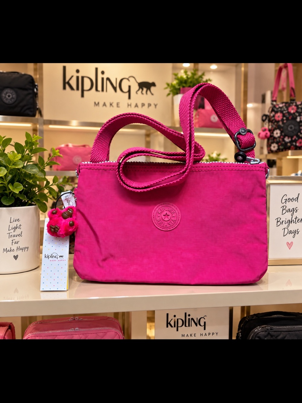 Kipling Bright Fuchsia Crossbody Bag with Monkey Charm